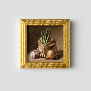 May include: A framed still life painting featuring a brown paper bag filled with green asparagus spears. A whole onion and a bulb of garlic are next to the bag. The painting is in a gold frame.