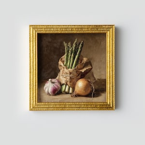 May include: A framed still life painting featuring fresh asparagus in a paper bag, a bulb of garlic, and an onion. The painting has a warm color palette with a gold frame. The vegetables are arranged on a dark background.