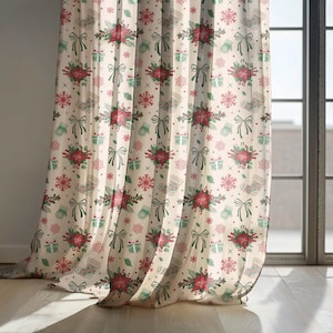 May include: Cream-colored Christmas-themed curtain with a repeating pattern of red poinsettias, green bows, snowflakes, gift boxes, and stockings. The curtain is hanging in front of a window, with sunlight illuminating the fabric.