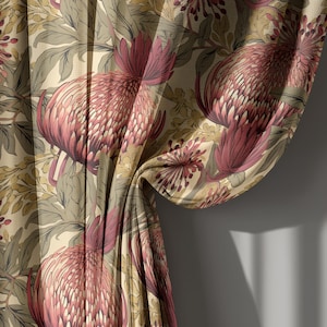 May include: Floral patterned curtain with a repeating design of large, stylized protea flowers in shades of burgundy and pink. The background is a muted beige with olive green leaves. The fabric is draped, showing the pattern's flow and texture.