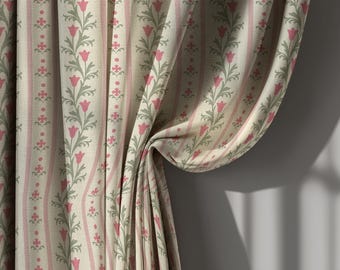 May include: Cream-colored curtain fabric with a repeating pattern of pink tulips and green leaves on vertical stripes. The fabric is draped, showing folds and texture, with a soft, neutral background.