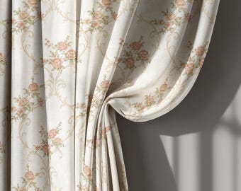 May include: Cream-colored floral curtains with a repeating pattern of pink roses and green leaves. The fabric drapes in soft folds, revealing a textured weave. The design includes scrolling vines and a subtle grid background.