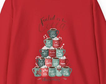 Sudadera navideña con diseño de árbol de taza y chocolate caliente para las fiestas de invierno.