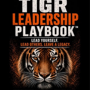 May include: A book cover with the title "TIGR LEADERSHIP PLAYBOOK" in white and orange text. The cover features a tiger's face and the text "LEAD YOURSELF. LEAD OTHERS. LEAVE A LEGACY." on a black background.