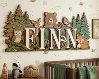 May include: Wooden name sign spelling "FINN" with forest animal cutouts. The sign features a bear, deer, owl, fox, and other woodland creatures. The letters are white with a brown border, and the background has a forest scene.