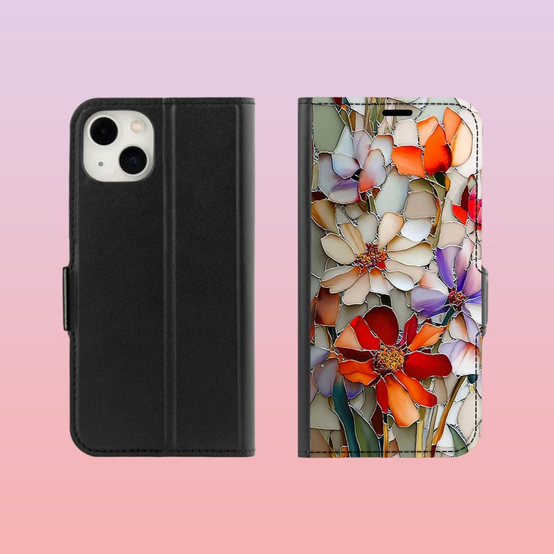 May include: Black phone case with a floral design. The case is shown open and closed. The open case reveals a colorful floral pattern with red, orange, white, and purple flowers. The closed case is solid black.