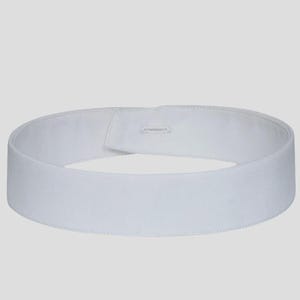 May include: A white detachable shirt collar, circular in shape, with a button closure. The collar is made of a smooth, likely cotton, fabric. The collar is designed to be worn with a shirt.