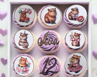 Capabara cupcake toppers, with a name and age. Set of 12