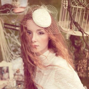 Bridal pill box hat with a birdcage, white hat with embroidery over french lace and veiling for a traditional bride, classical wedding hat