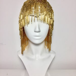 CARNEVAL, burlesque show headpiece, opulent golden wig,fake hair wig, statement hair accessory, costume design crown,burning man wig, gatsby