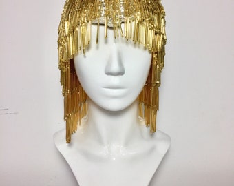 CARNEVAL, burlesque show headpiece, opulent golden wig,fake hair wig, statement hair accessory, costume design crown,burning man wig, gatsby