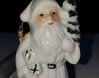 Ceramic white and gold Santa with tree excellent condition