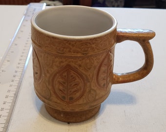 Pottery style mug with leaves excellent condition