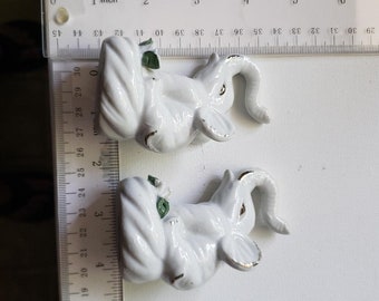 2 Vintage white elephant figurines with flowers excellent condition