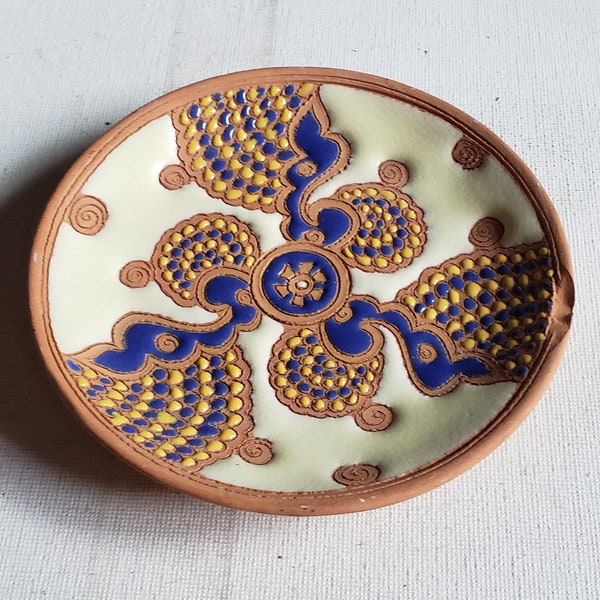 Small trinket dish Greece hand made signed small chip good condition