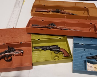 Toy plastic replica collector pieces with cases