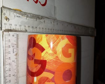 Anthropologie coffee mug with Letter G.  Orange marked. excellent condition