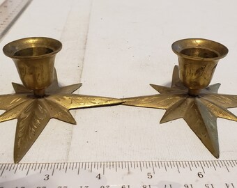 Set of 2 star shaped candle holders excellent condition.