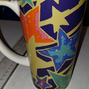 Coffee mug with colorful stars ceramic in excellent condition