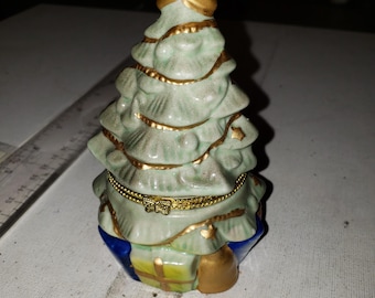 Christmas tree trinket box with tiny train trinket inside.  Christmas decor excellent condition