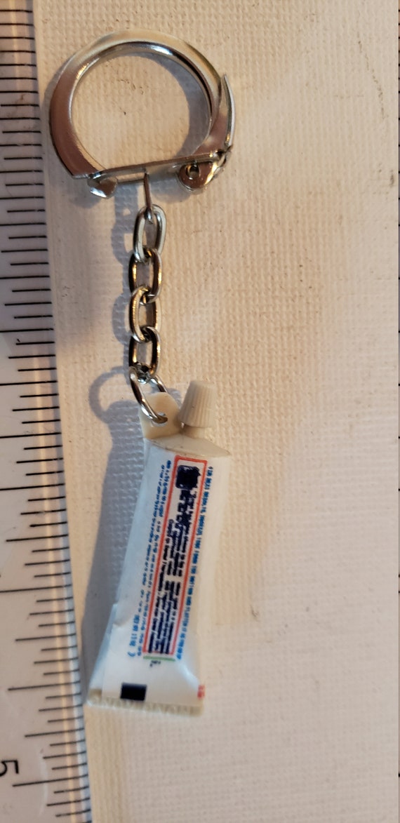 Vintage key chain green Crest toothpaste tube excelle… Gem