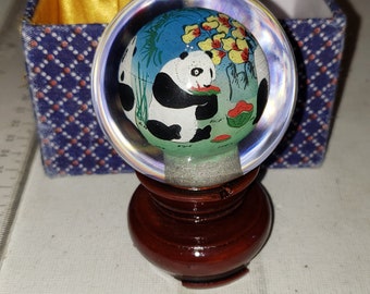 Reverse painted glass ball with panda bears on stand excellent condition