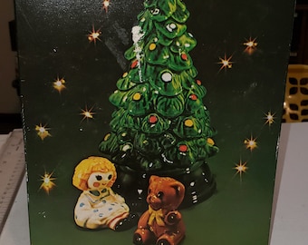 Vintage Avon Merry Christmas Holiday tree and salt and pepper chips on bear good condition