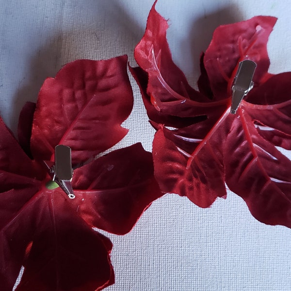 2 silk flower poinsettia flowers with clips excellent condition