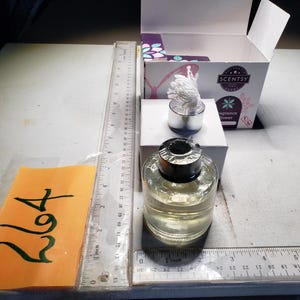 May include: A set of three ceramic mugs with a speckled, matte finish. The mugs are in shades of cream, light gray, and dark gray. Each mug has a simple, minimalist design, perfect for coffee or tea.