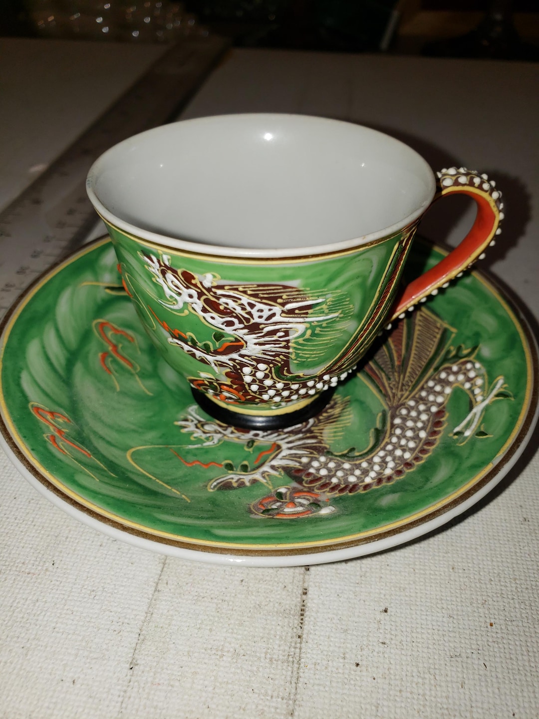 Green Dragon Ware Small Tea Cup and Saucer. Marked Occupied Japan