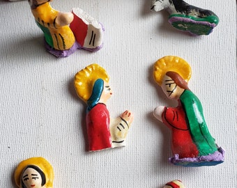 South American style nativity in house damaged pieces