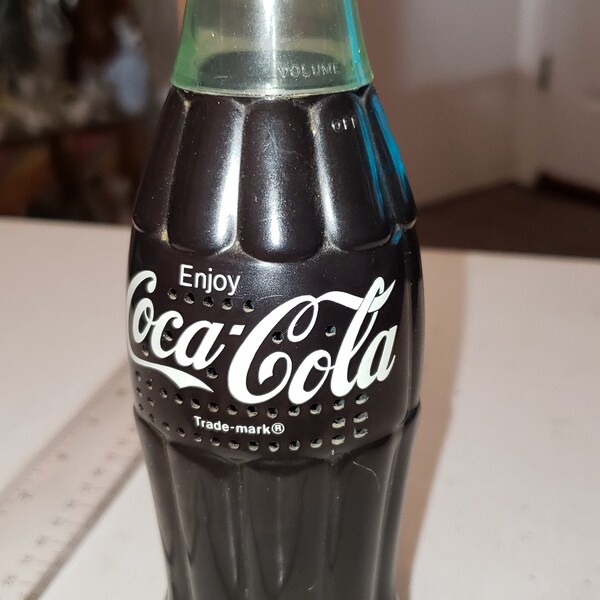 Plastic Coke bottle AM radio works.  In good condition