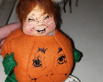 Anna Lee doll Child in a pumpkin Halloween decor good condition