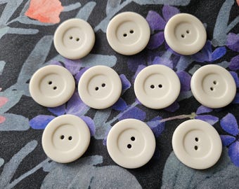25 mm crème krijt polyester knopen 1" (gebroken wit)