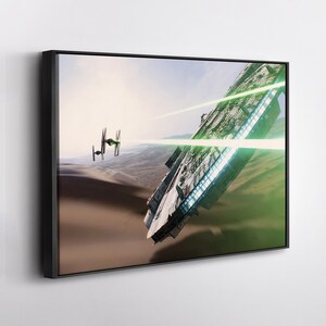 May include: A framed canvas print featuring a science fiction scene. A large, detailed spaceship fires a green laser beam at a smaller, black spacecraft. The background shows a desert landscape under a bright sky.