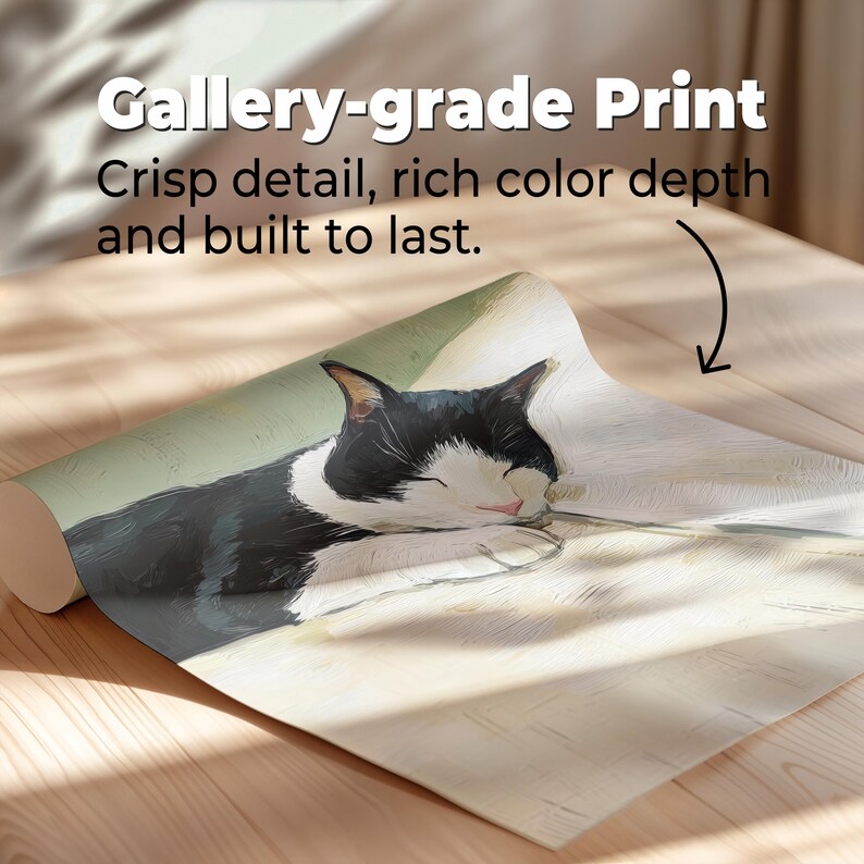 May include: A rolled-up gallery-grade print featuring a sleeping black and white cat. The print displays crisp detail and rich color depth. The text on the print reads: "Gallery-grade Print. Crisp detail, rich color depth and built to last."