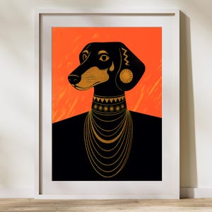 May include: Art print of a stylized dachshund dog with gold accents and a black body. The dog is set against an orange background and framed in a white border. The dog is wearing a gold necklace.