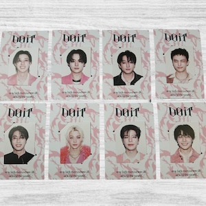 May include: Eight photo cards with individual portraits. Each card displays the word "Doit" and a person's photo. The cards have a pink floral pattern and the text "stay kids everywhere all around the world."