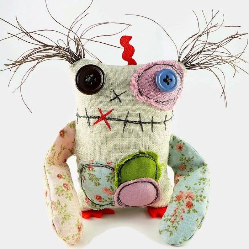 Stuffed monster doll, dorm room decor. Shelf decor object