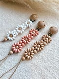 Flower Pacifier Clip Girl - Custom Baby shower Gift - Babygirl Binky Holder - Silicone Baby Dummy Chain - Silicone Pacifier Clip - Baby Gift product logo