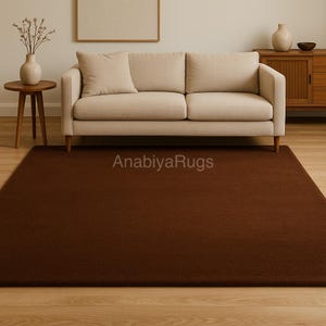 Hand-Tufted Solid Brown Wool Rug: Earthy Elegance