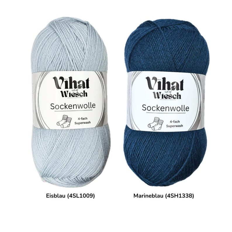 May include: Two skeins of Vihat Wiesch Sockenwolle yarn. One is light blue, labeled "Eisblau", and the other is dark blue, labeled "Marineblau". Each skein has a white label with the brand name and "Sockenwolle" printed on it. The labels also indicate the yarn is 4-fach Superwash.