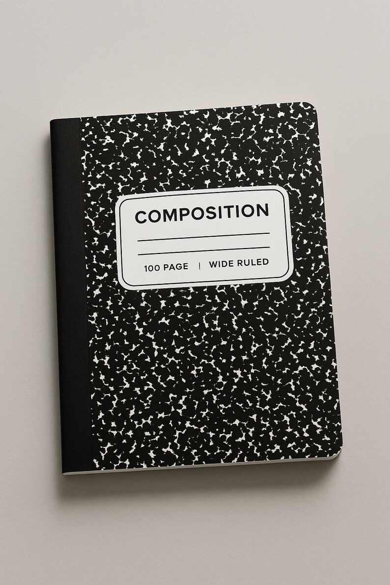 May include: A composition notebook with a black and white speckled cover. The notebook has a white rectangular label that reads "COMPOSITION" with the text "100 PAGE | WIDE RULED" below it. The spine is black.