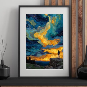 Puede incluir: Impresión artística enmarcada que representa una vibrante puesta de sol con una figura silueteada en un acantilado. La obra presenta un cielo dramático con remolinos de azules, amarillos y naranjas, y un marco oscuro.