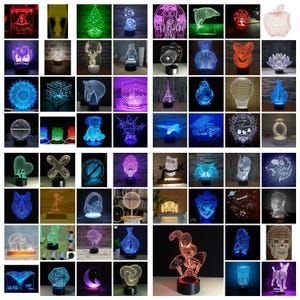 Może przedstawiać: Kolekcja nocnych lampek LED 3D w różnych kształtach, w tym zwierząt i przedmiotów. Każda lampka ma czarną podstawę i emituje kolorową poświatę, tworząc efekt dekoracyjny i nastrojowy. Lampki przeznaczone są do dekoracji wnętrz.