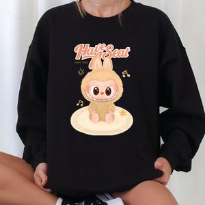 Labubu Sitting PNG | Cute Kawaii Labubu Clipart | Vinyl Face Style Digital Art | Cartoon Labubu PNG for Sublimation & Stickers