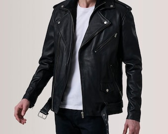 May include: Black leather motorcycle jacket with an asymmetrical zipper closure, multiple zippered pockets, and a notched collar. The jacket features silver-tone hardware and a belt detail at the waist. A classic outerwear piece.