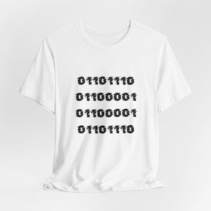May include: White t-shirt with a crew neck. The shirt displays four lines of binary code printed in black. The binary code has a distressed effect, giving it a textured appearance. The t-shirt is made of a soft material.