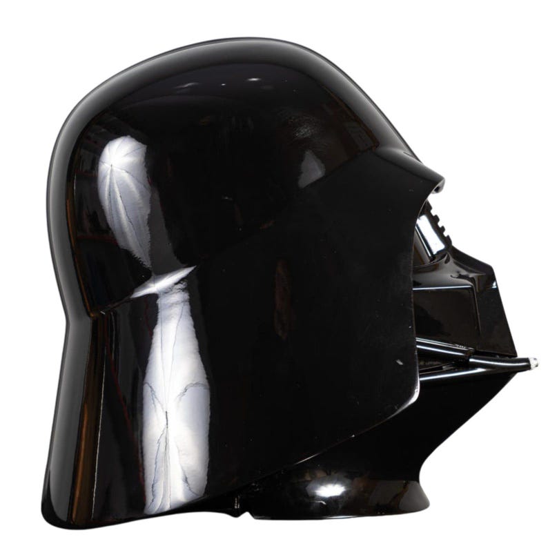 Side angle of Darth Vader leather cosplay costume showing helmet, detailed armor panels, shoulder pads, cape flow, gloves, belt, and iconic helmet, authentic The Empire Strikes Back Star Wars cosplay suit, ideal for cosplay events, Halloween, sci-fi conventions, fan photoshoots, collectors, and Star Wars themed costume parties