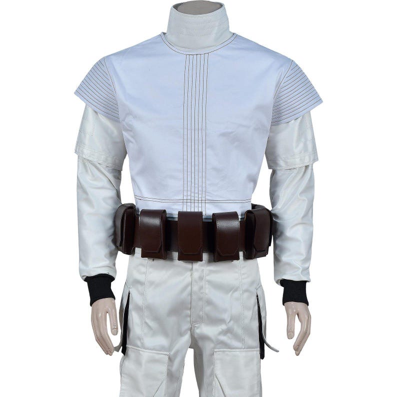 May include: A white costume featuring a high collar, long sleeves, and a brown belt with multiple pouches. The top has vertical stitching and short sleeves. The pants are white with a side pocket. Black cuffs are visible at the wrists.